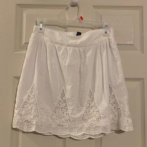 White skirt with lace design
